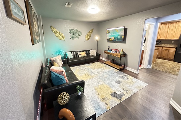 Come chill in our living room sanctuary—it's where comfort and fun hang out together!