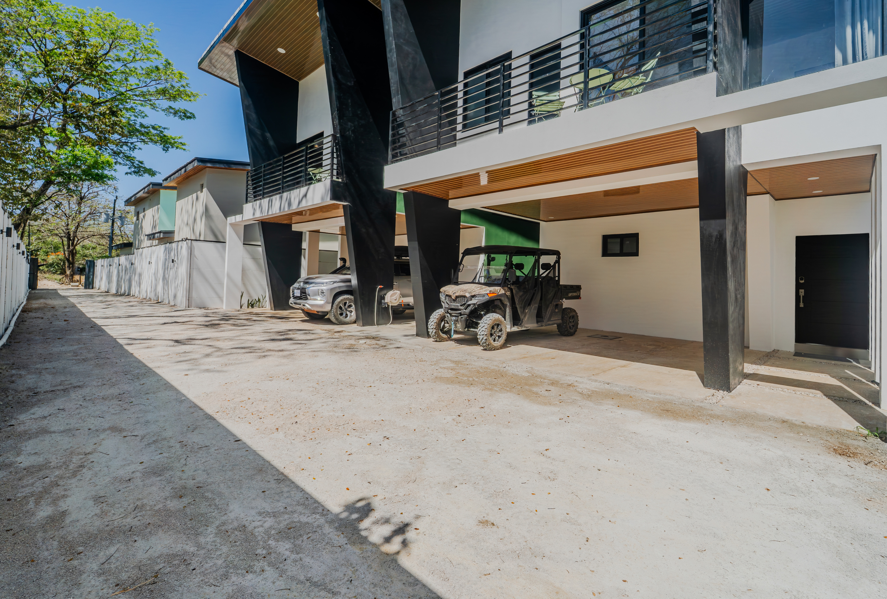 Both houses from the driveway. Parking for the whole group.