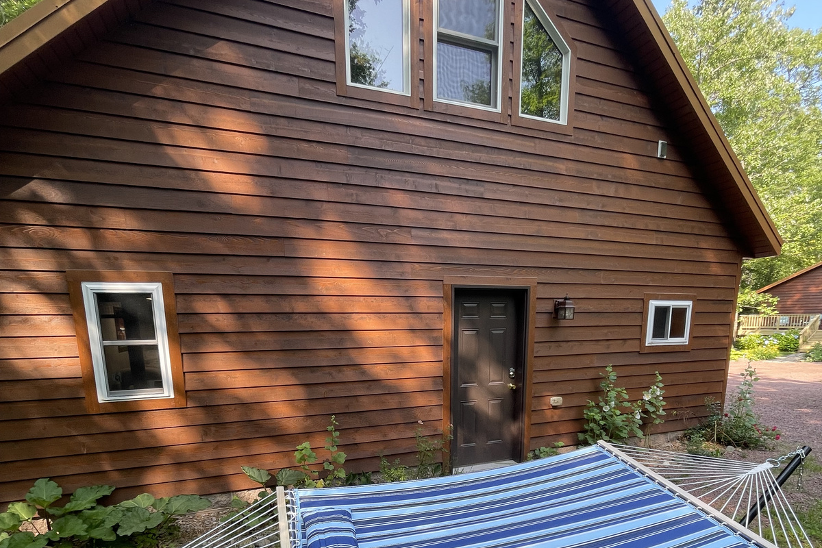 Rock Garden Cottage 
Hammock & grill back of cottage next to shed wooded views