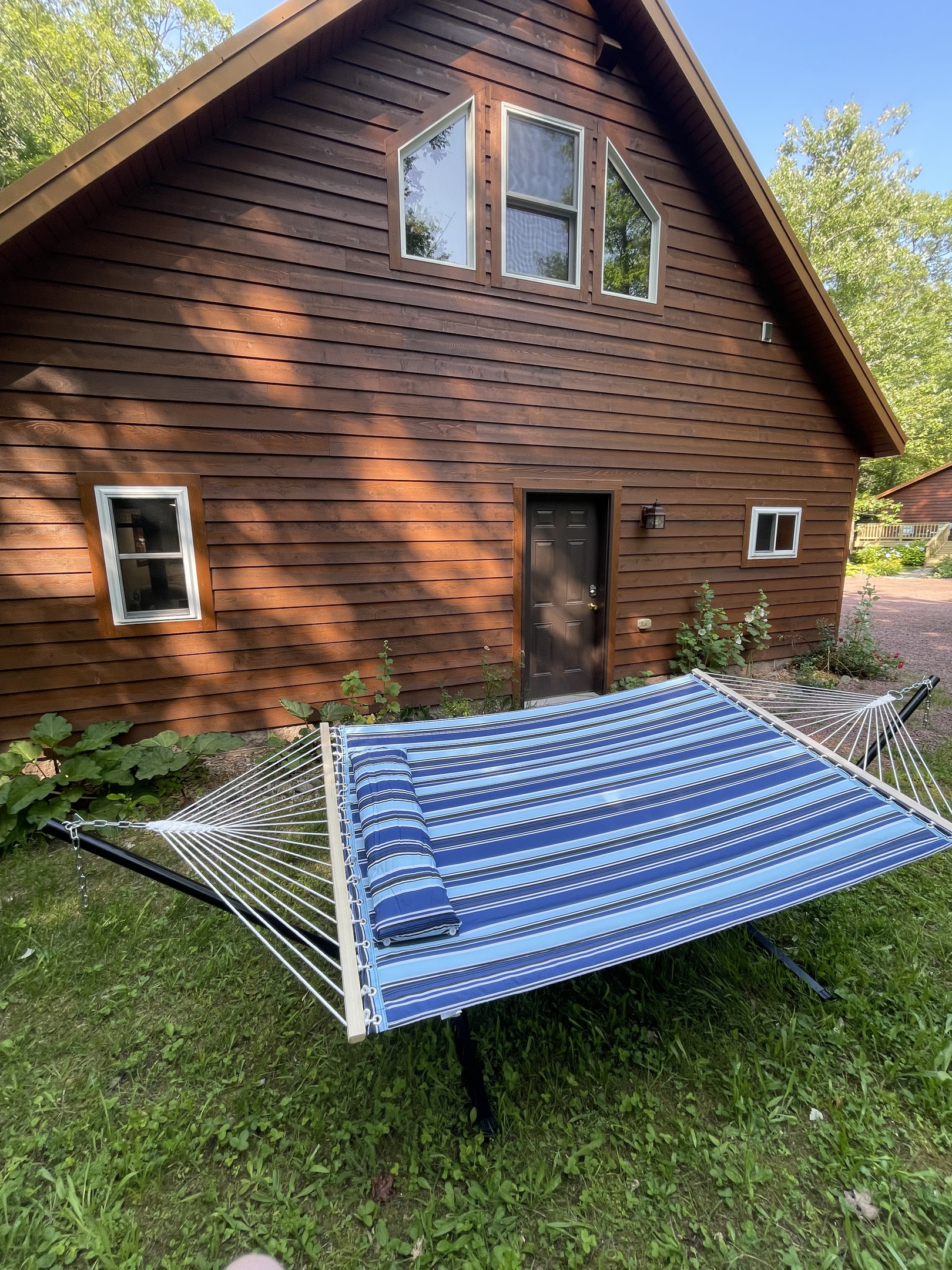 Rock Garden Cottage 
Hammock & grill back of cottage next to shed wooded views