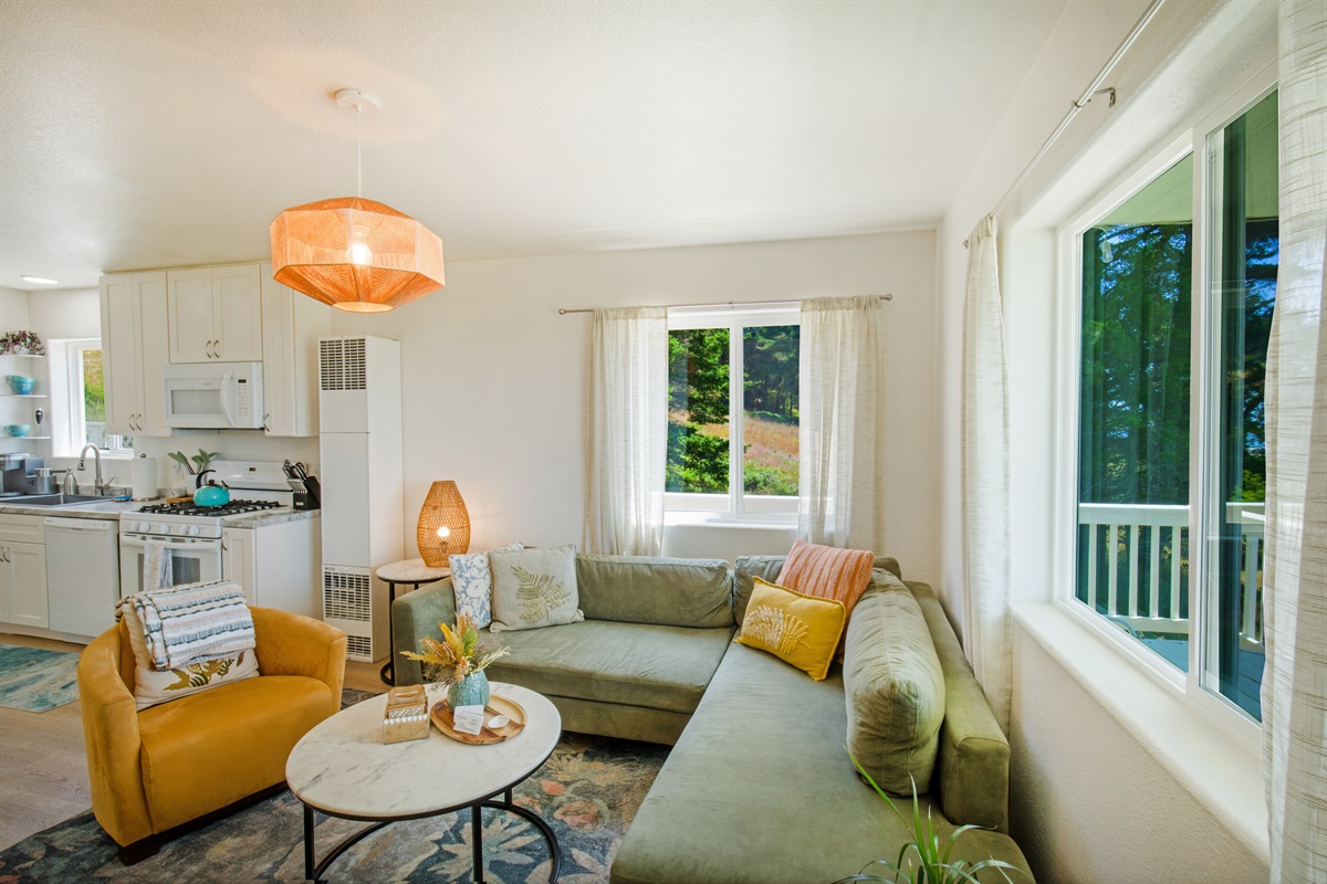 Open downstairs area of Unit 1 will allow you to cook and mingle at the same time