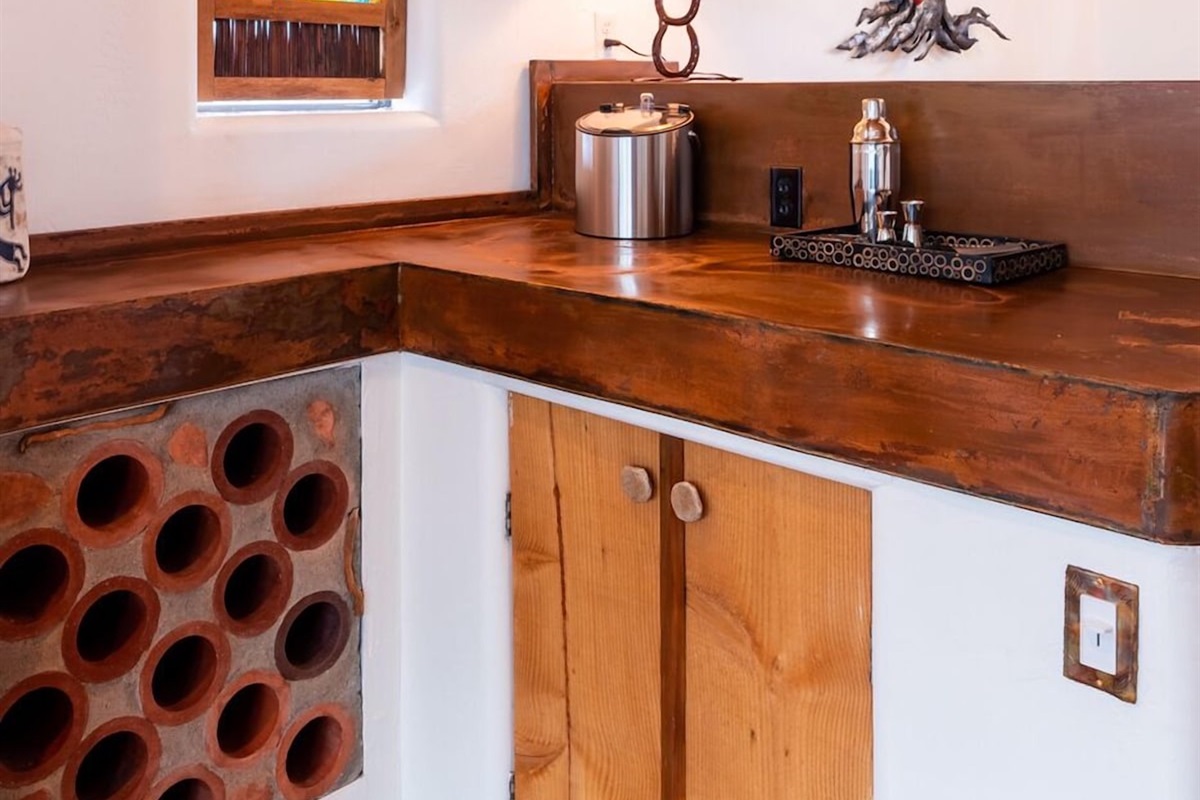 The mini bar is only one of the home's many amazing luxuries.