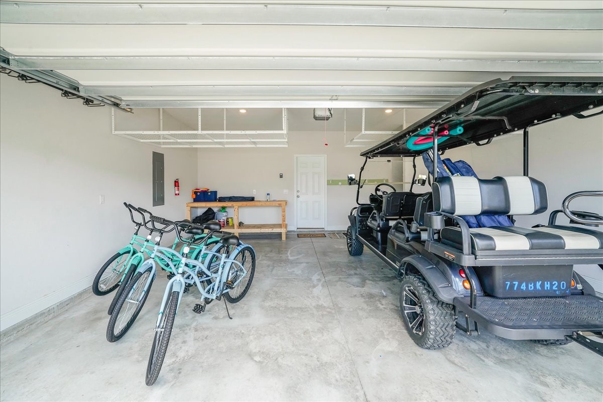 Adventure-ready garage with 6-seater golf cart & Bikes
