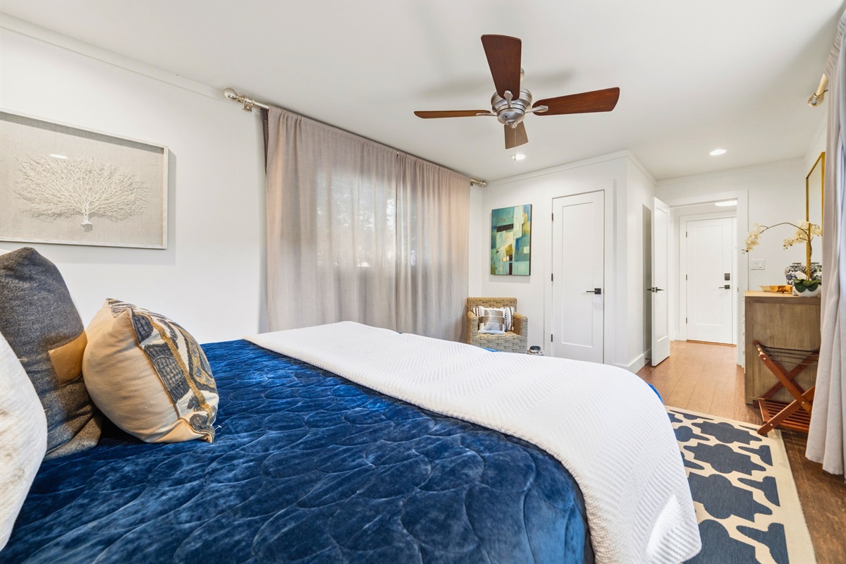 Unwind in this inviting bedroom that offers plenty of space to spread out, with cozy bedding and a relaxed atmosphere that makes settling in effortless.