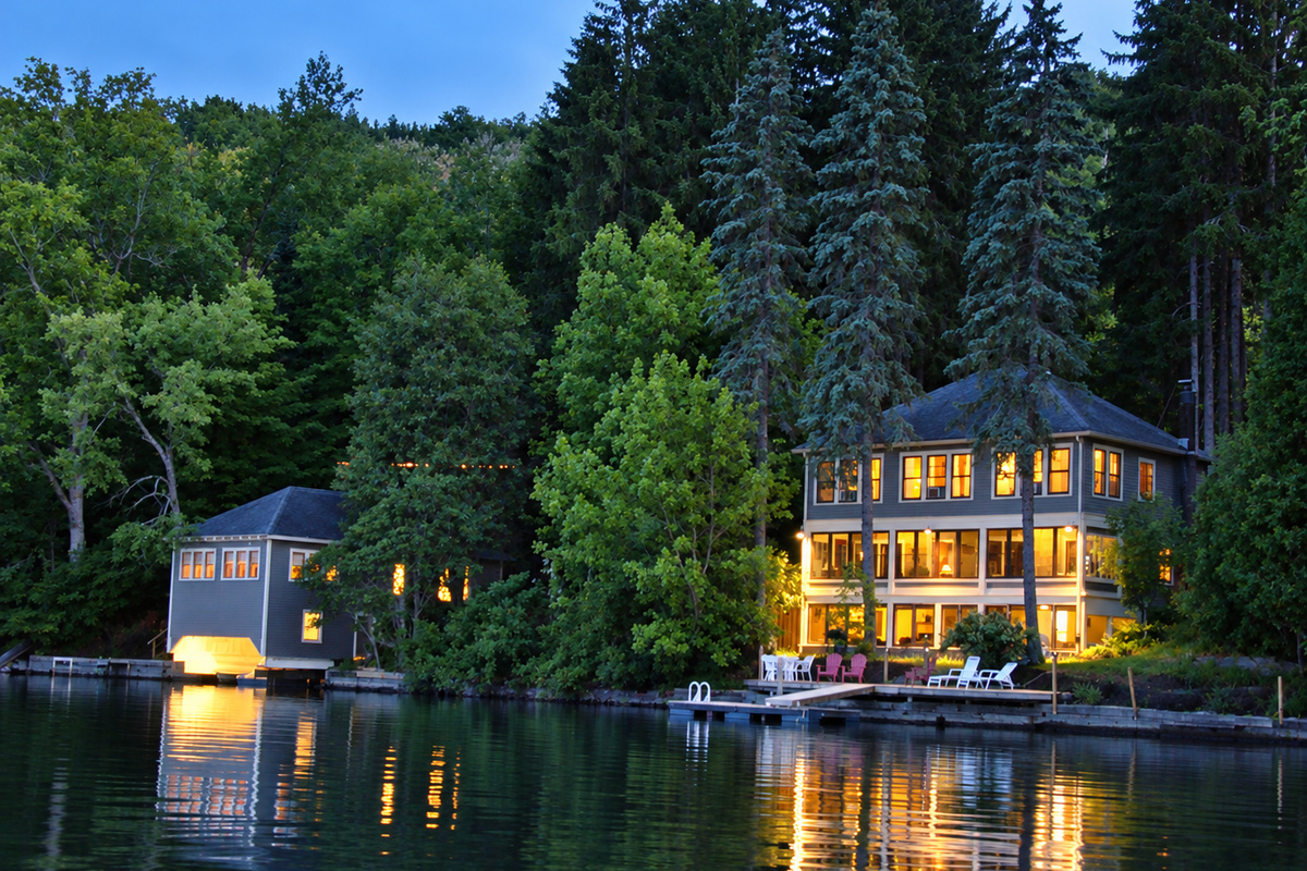 Goodyear Lodge Boathouse on left + Goodyear Lodge on right at night.