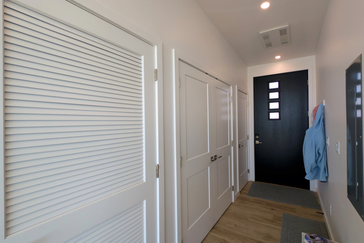 entry way - laundry closed behind louvered door.