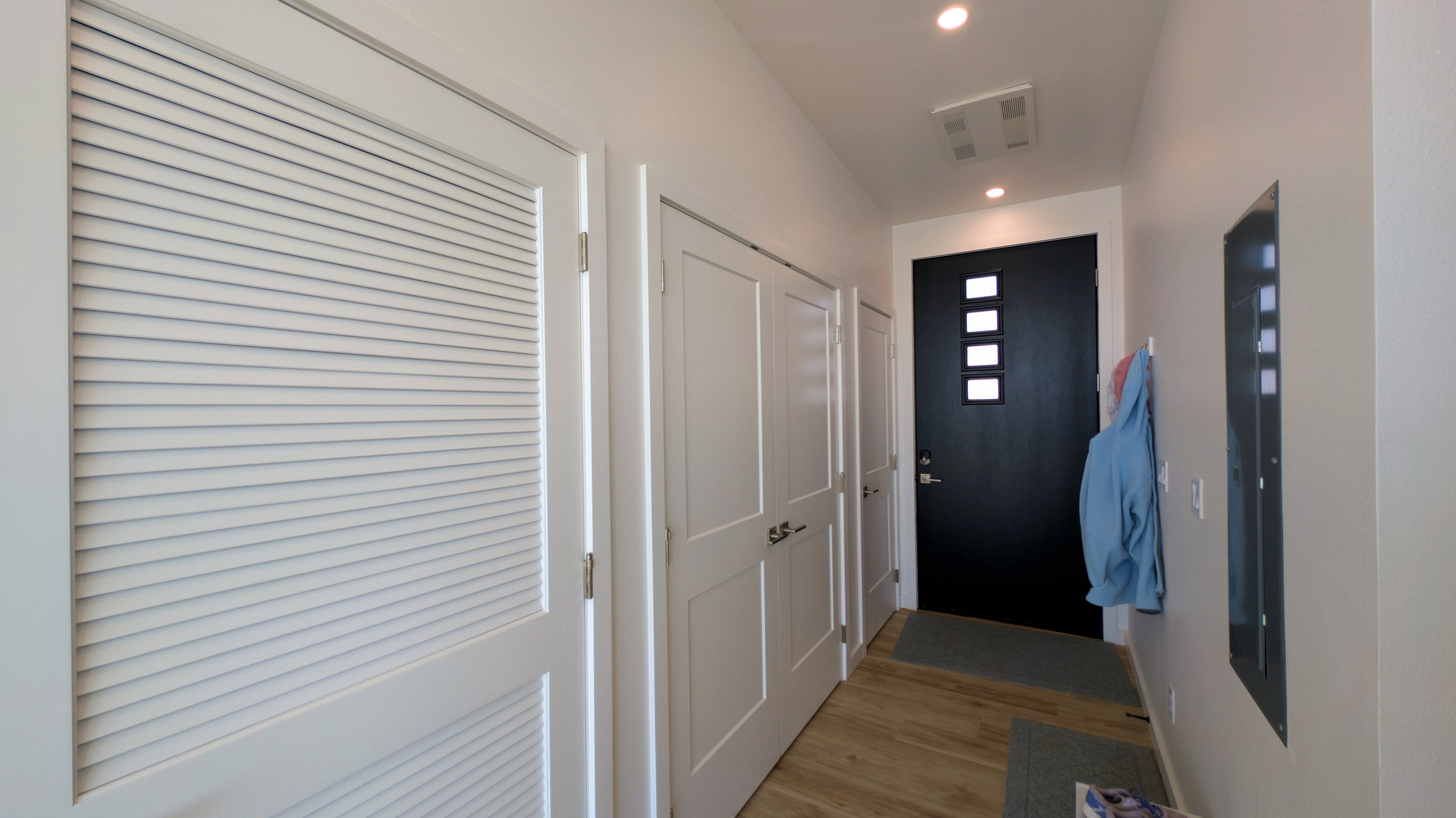 entry way - laundry closed behind louvered door.