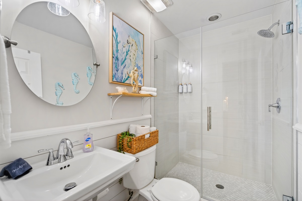 Bathroom 1 is fully renovated with a walk-in shower.