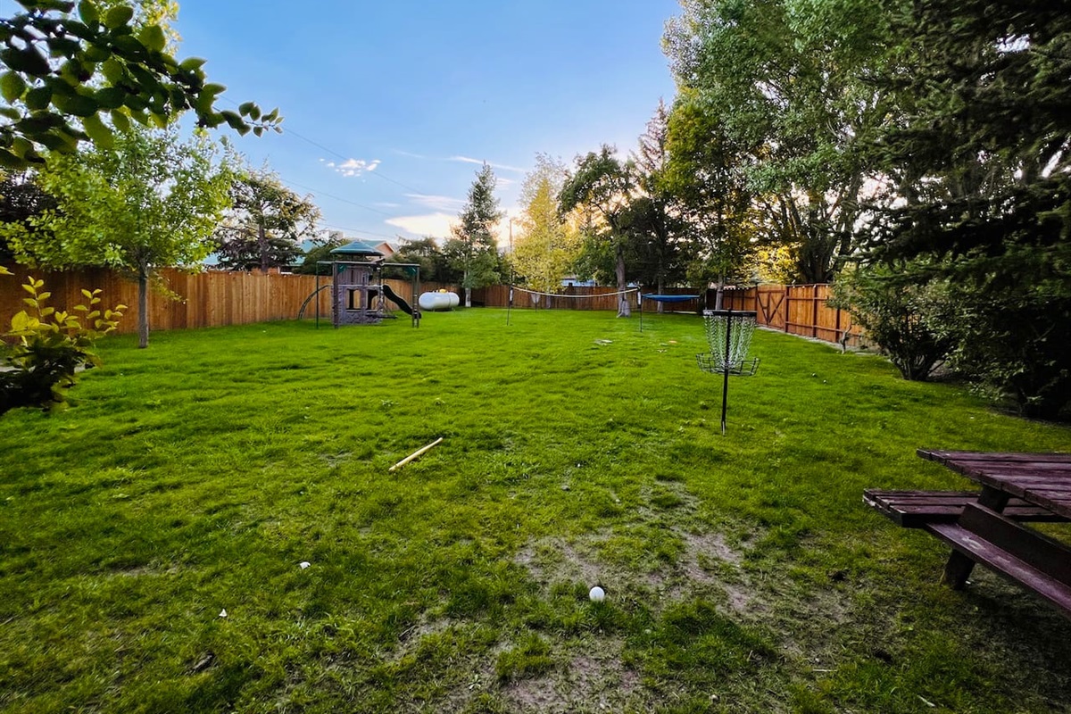 Fenced in, private and playful is the front yard made especially for family fun.