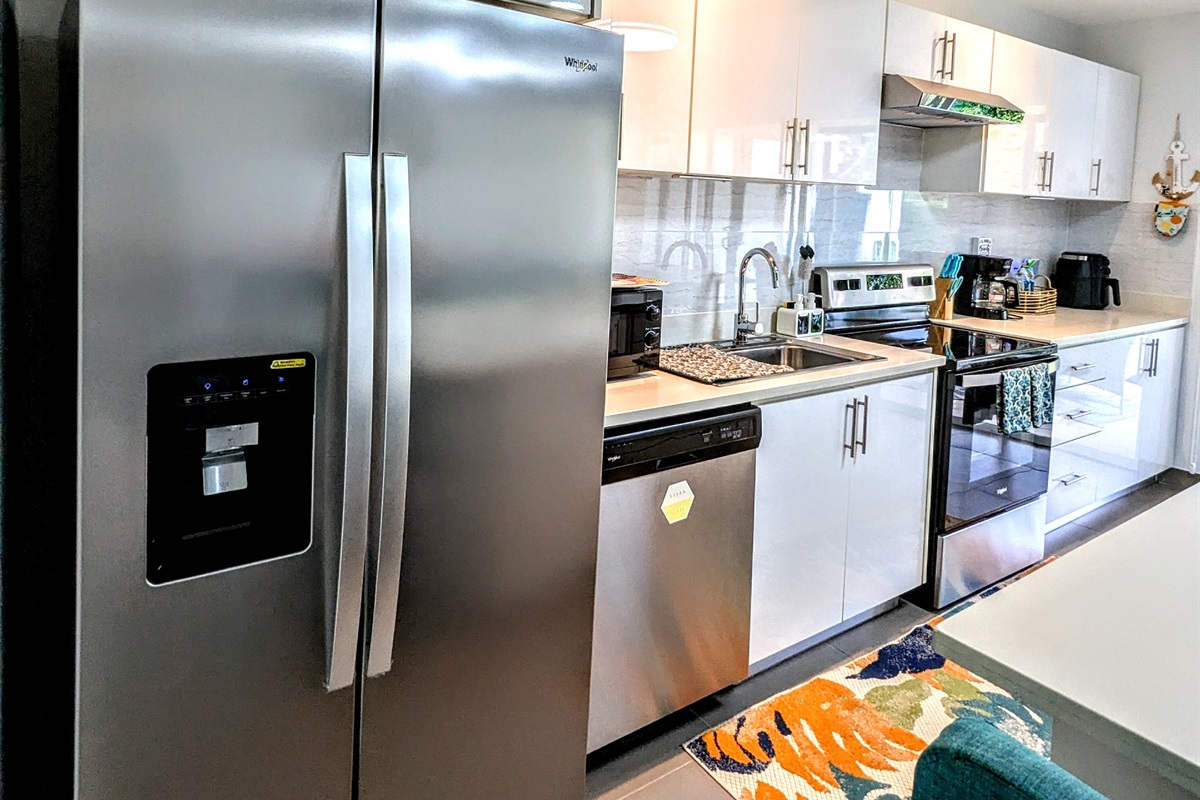 Large Fridge with Ice maker and fully stocked kitchen