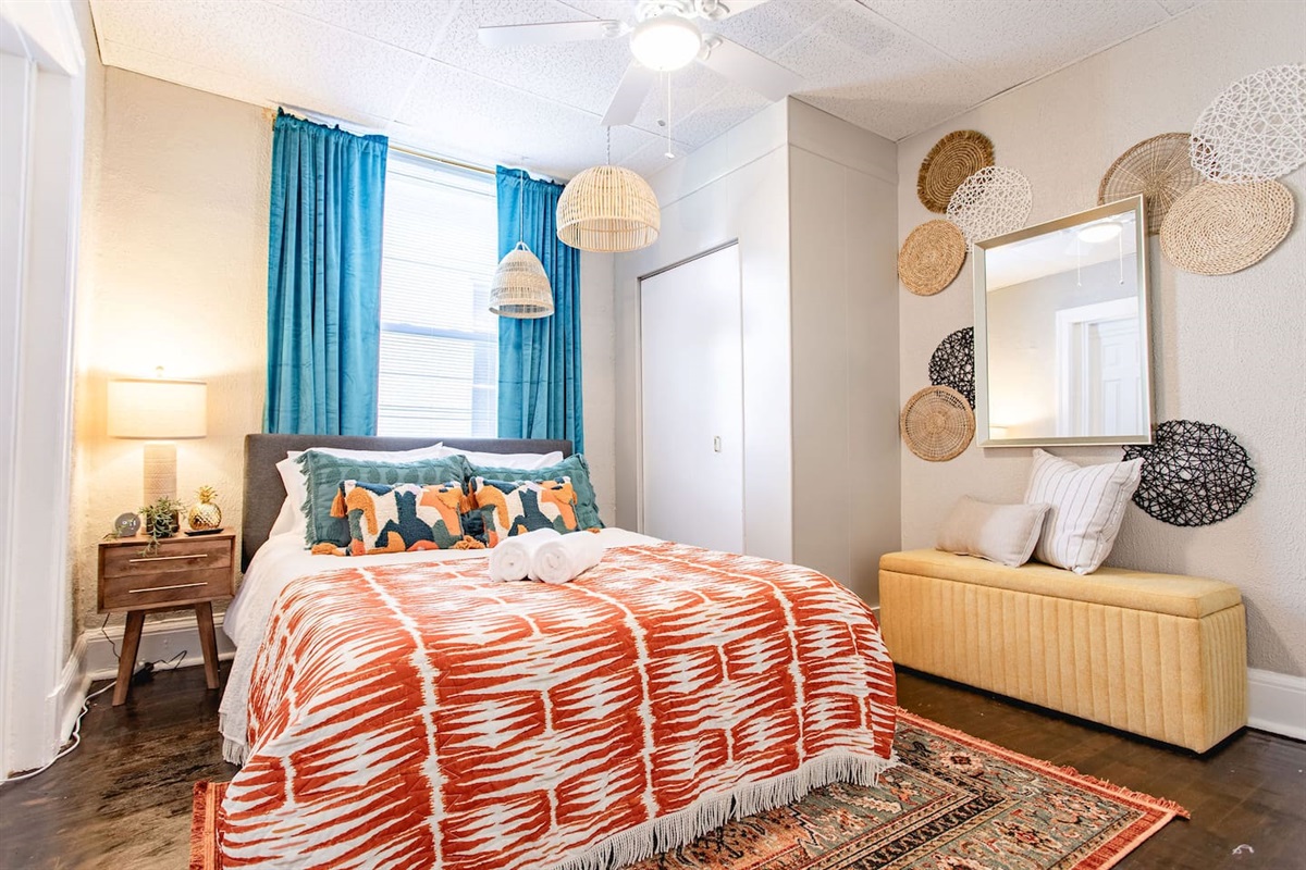 Cozy bedroom with a bohemian theme, featuring eclectic décor, vibrant textiles, and a relaxed, artistic atmosphere that creates a peaceful and inviting retreat.