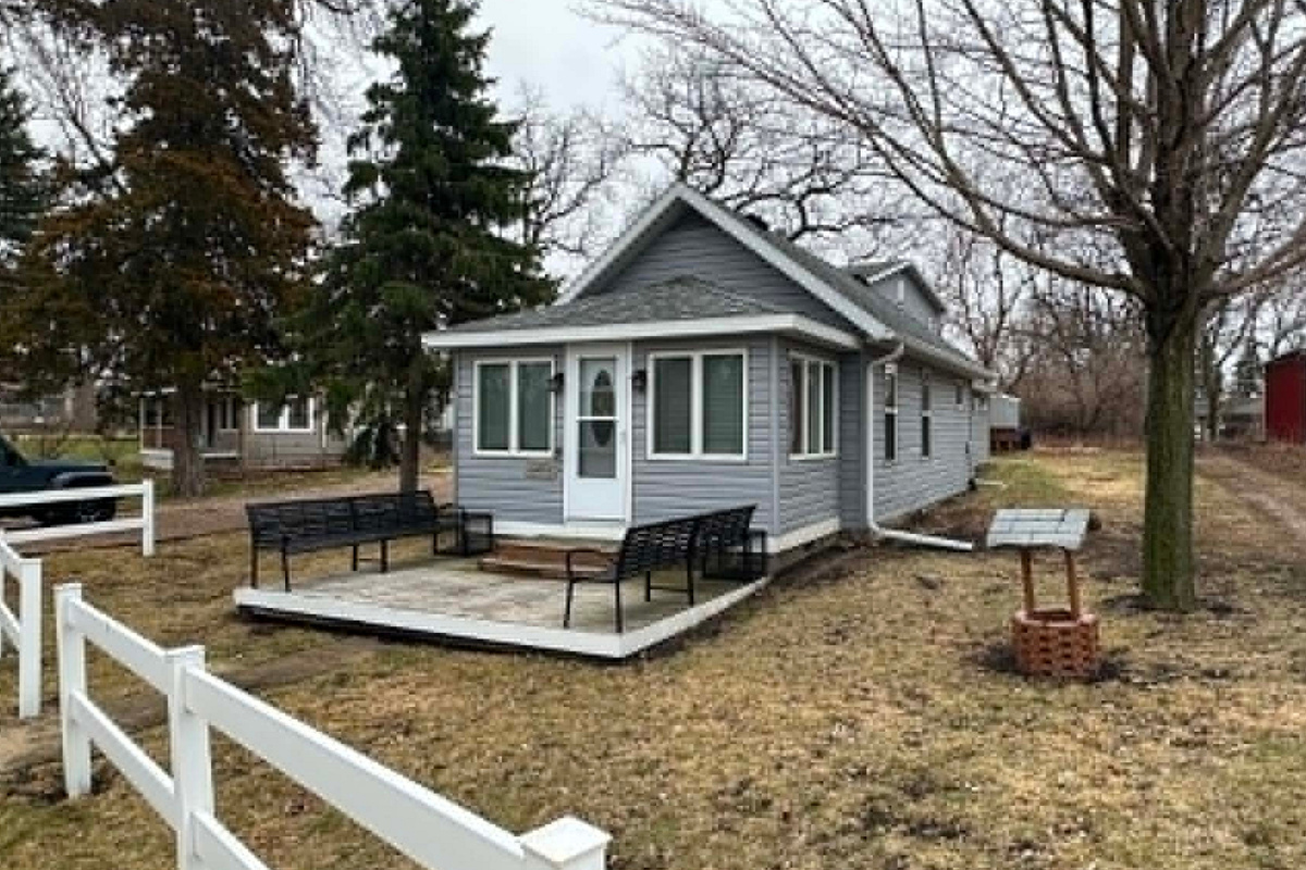 The house is across from Big Spirit Lake. You look out the front door and the view is the lake. 