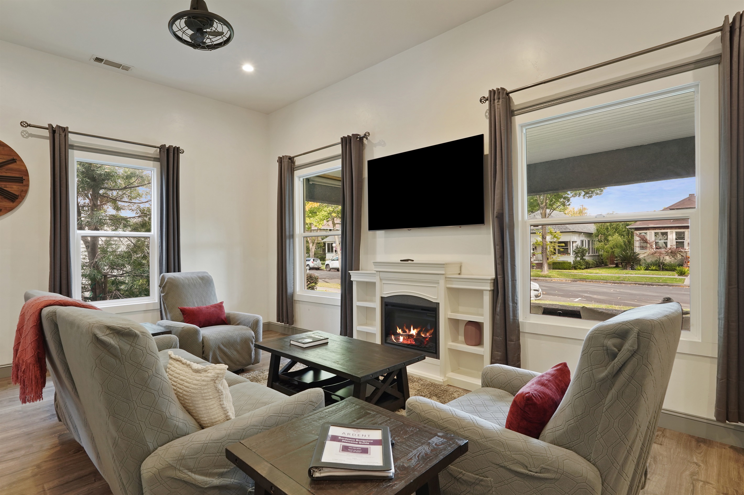 Gather in the living room to enjoy your favorite show on the smart TV and the ambiance of the electric fireplace.