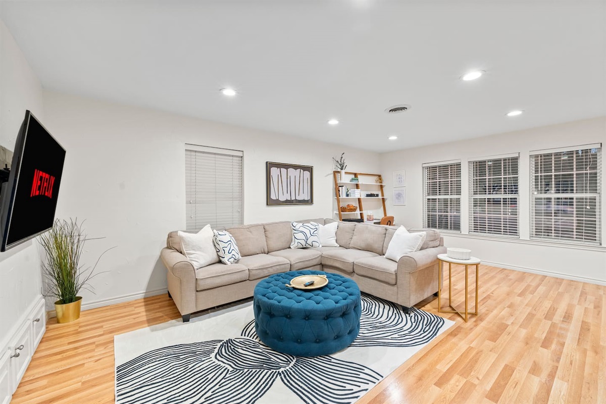 Enjoy bright, airy, open-concept lounging in this professionally-designed space! There is a dedicated workspace, a sleeper couch with extra linens, a smart TV, and board games for your enjoyment.