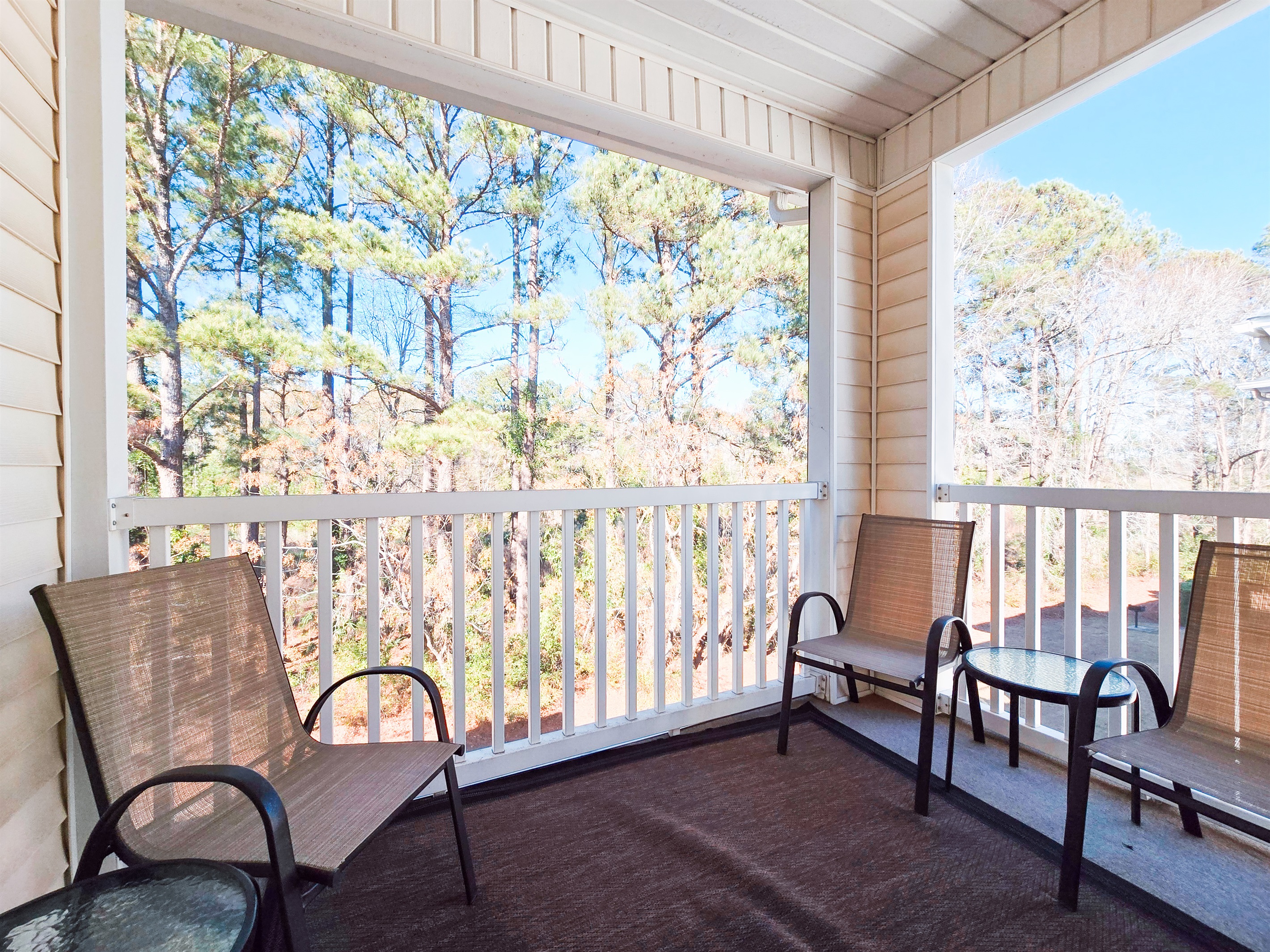 Private 3rd-floor balcony with peaceful nature views—your new favorite vacation hangout