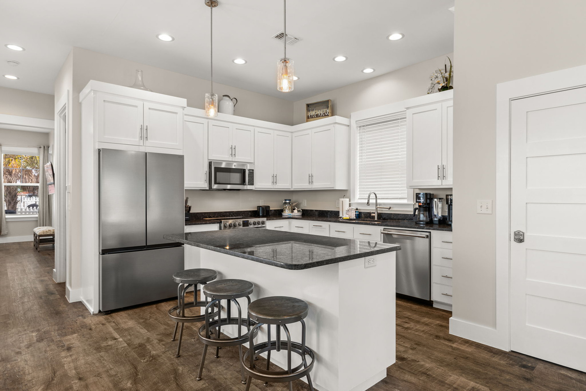 Spacious kitchen island with extra seating — perfect for breakfast before heading to the beach