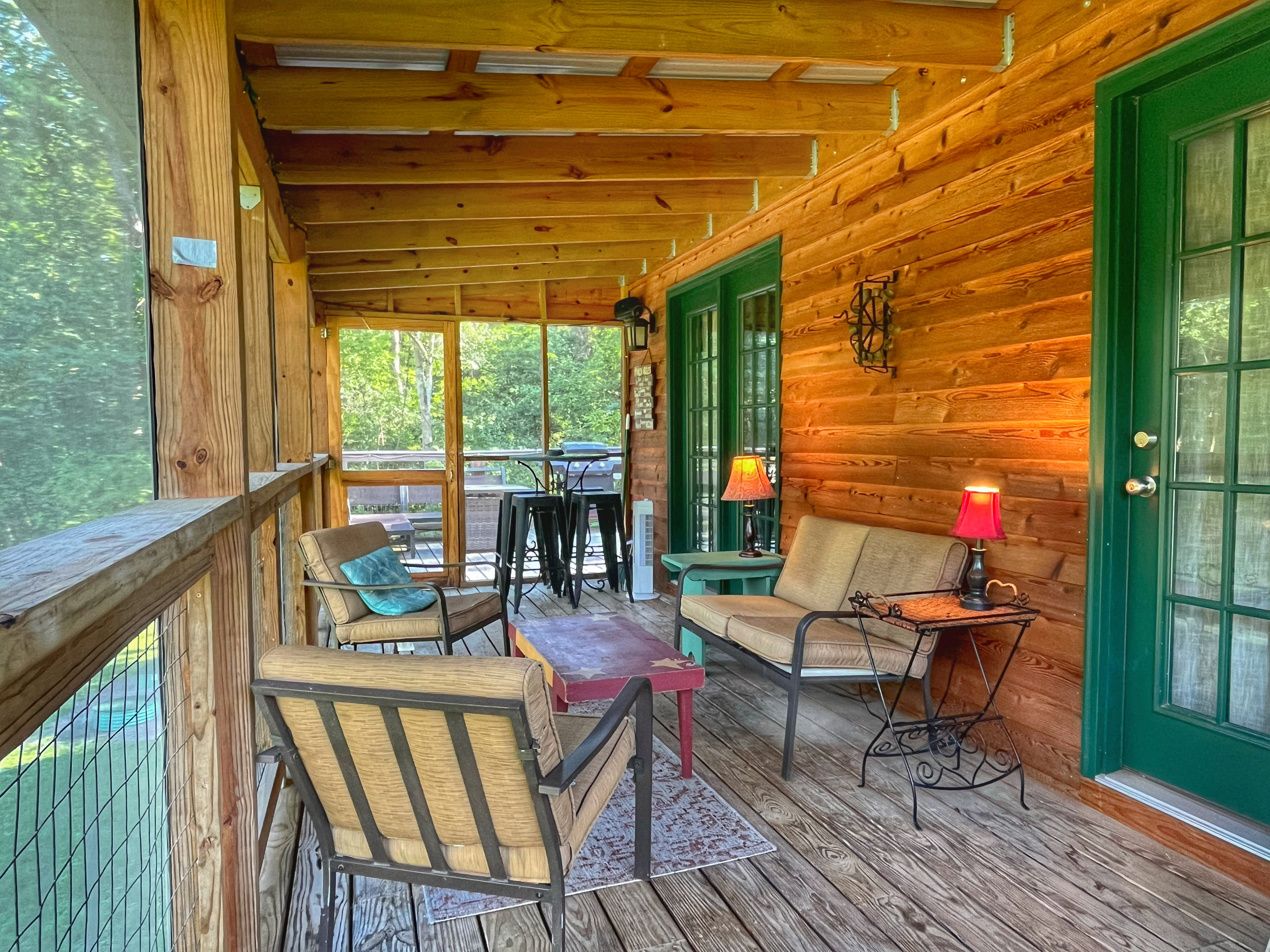 Unwind and relax on the peaceful screened-in porch!