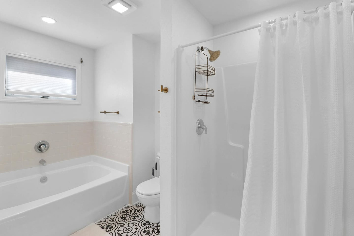 Soak in the tub or step into the walk-in shower &mdash; the master bath gives you both options and plenty of space.