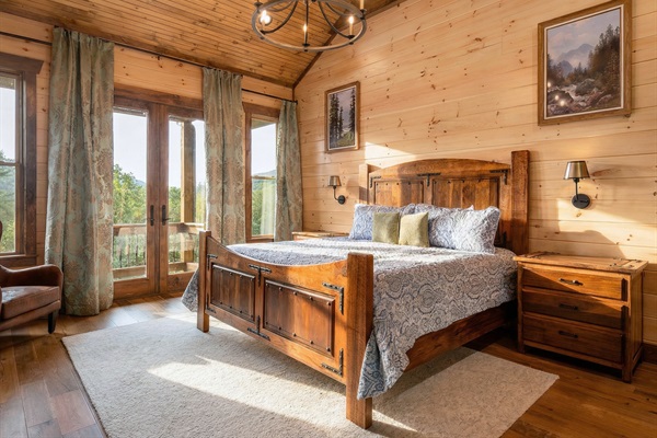 Rest easy in this spacious king bedroom, offering comfort and a peaceful atmosphere.
