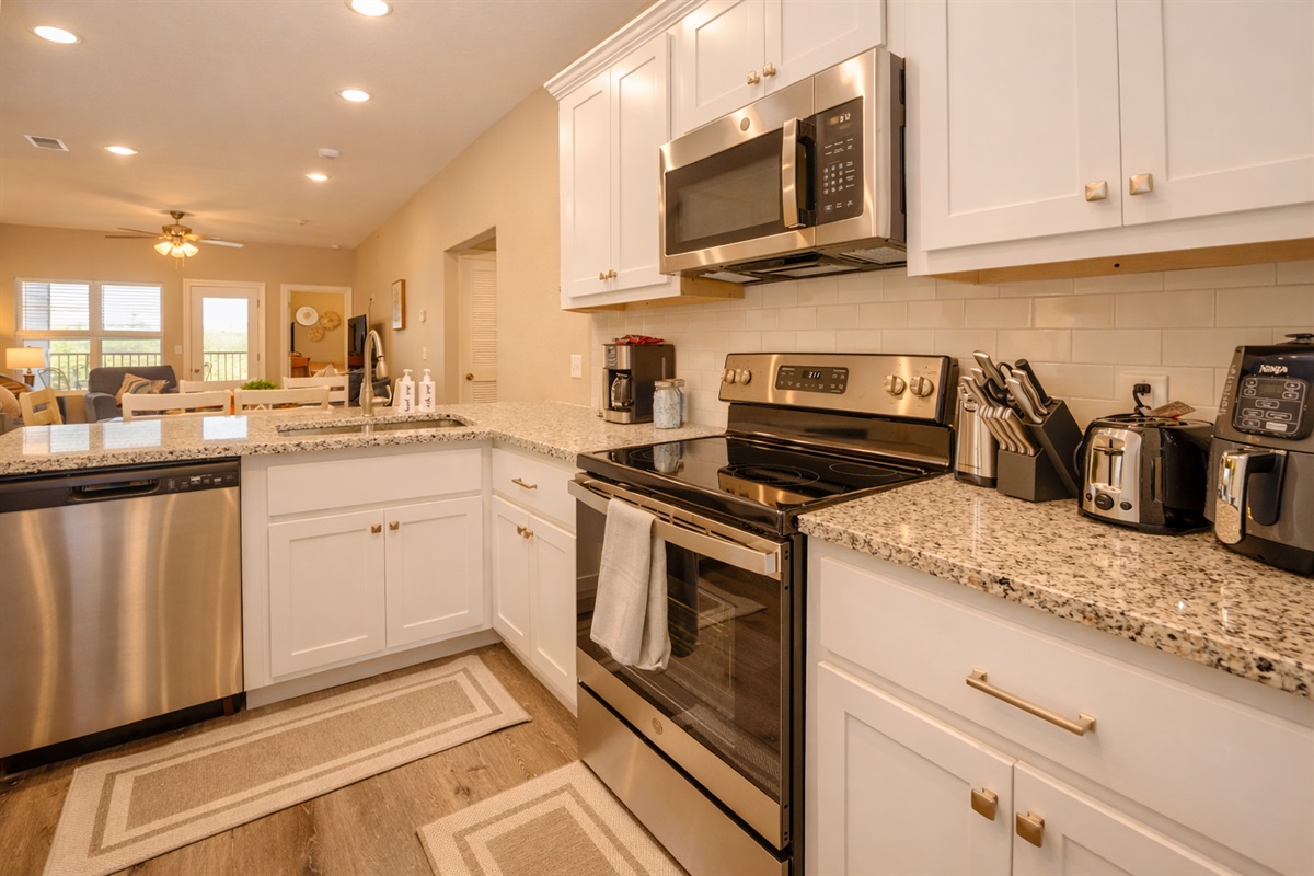 Modern kitchen stocked with everything you need to cook