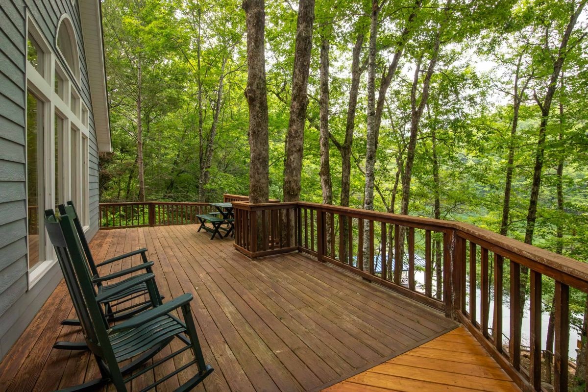 Deck Retreat: Sip drinks on a spacious deck surrounded by serene forest views!

