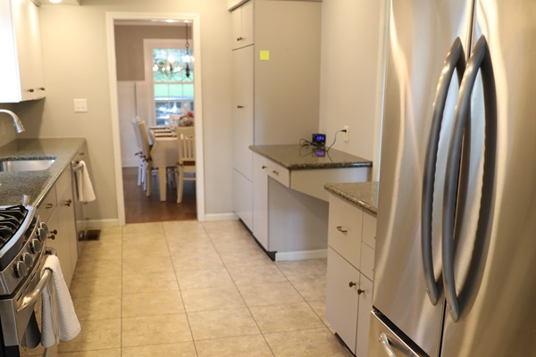 Kitchen showing stove, microwave, sink, dishwasher, pathway to dining room, pathway to dinette, fridge