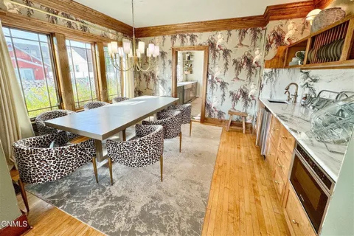A roomy kitchen with dining space, bar seating, and a comfortable flow for group stays.