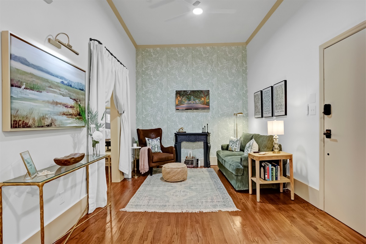 Comfy living area with a queen sleeper sofa and smart TV.
