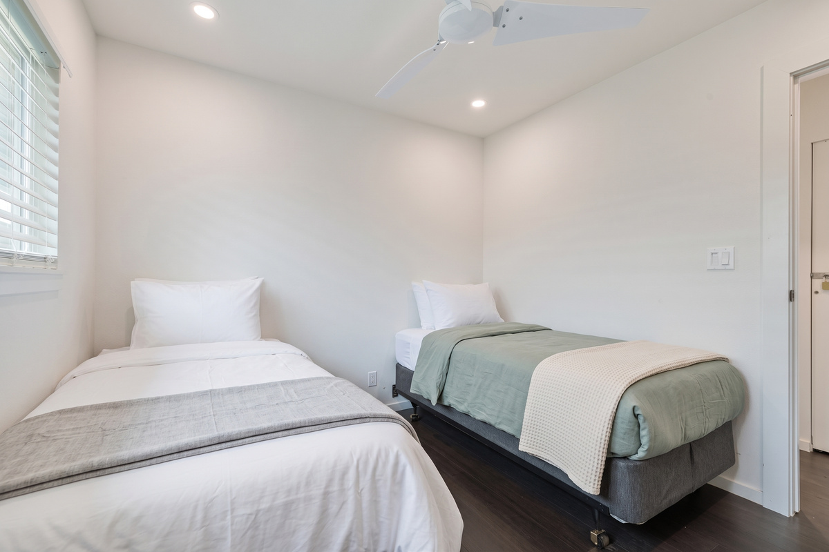 Twin Bedroom | Representative Interior. Unit finishes, furnishings, and decor may vary.