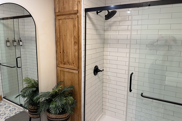 Full bath downstairs has walk in shower