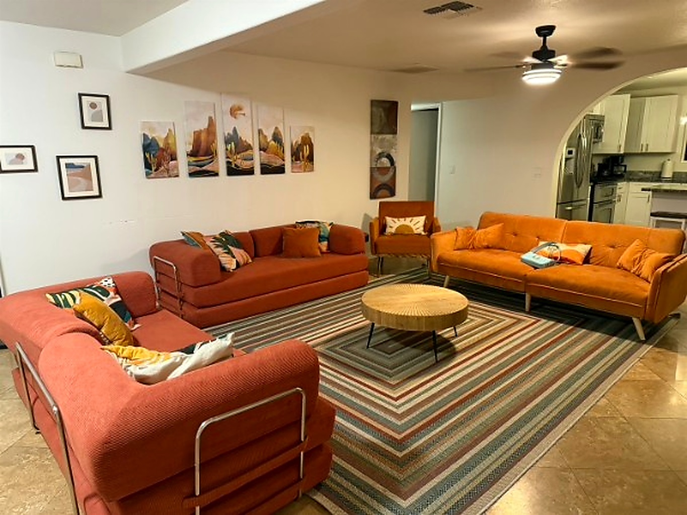 Gather in the cozy living room, where stories flow and movie nights stretch into late laughs 🧡✨