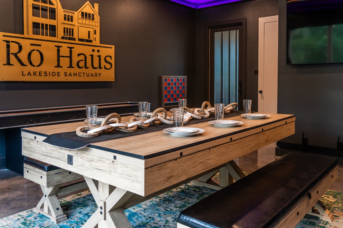 The dining area features a sophisticated table setup, ready to host any meal in a charming ambiance.
