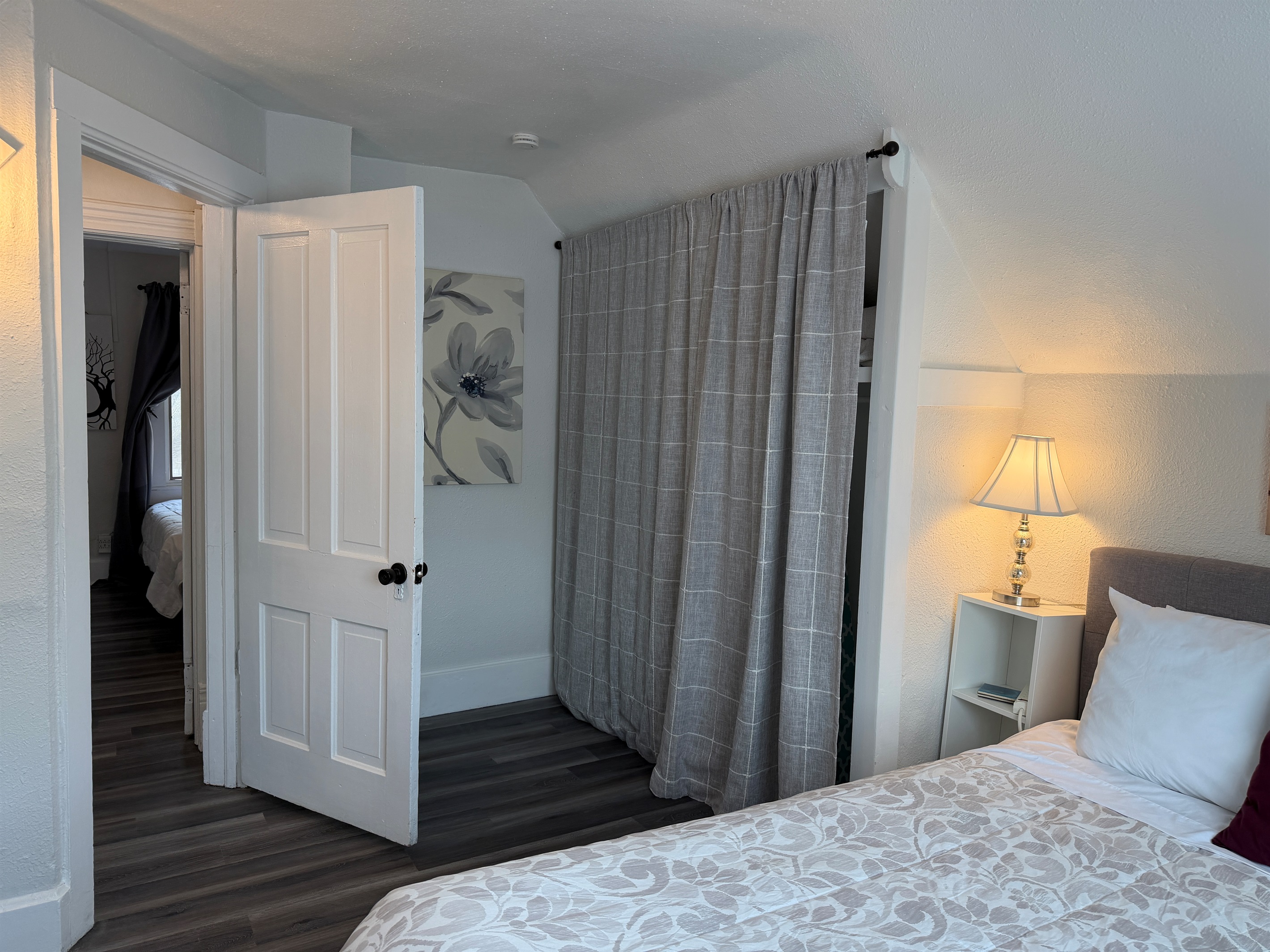 There's a large closet with iron and ironing board, extra blankets and a fan.