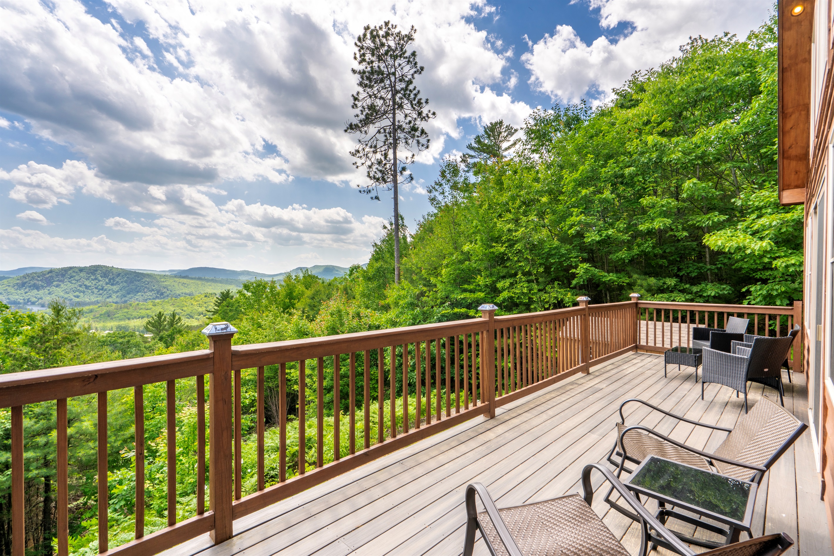 Relax and enjoy the views from the wrap around deck!