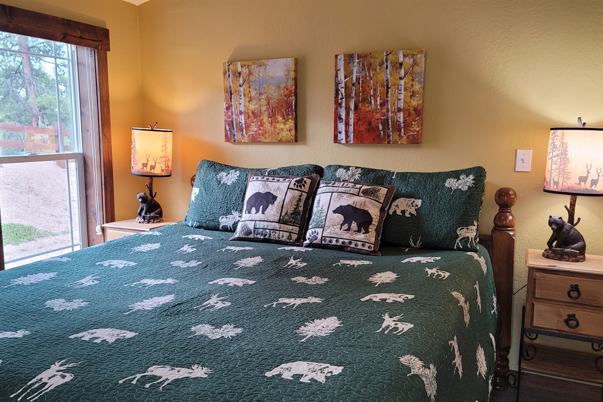 The Guest bedroom with King size bed and access to the wrap around deck