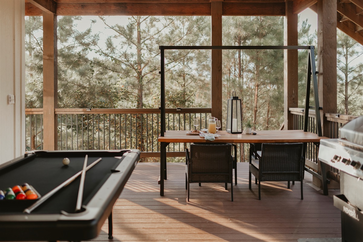 Play a round of pool, then enjoy a romantic dinner on the secluded hillside deck. The deck offers stunning sunset and sunrise views for miles, the perfect backdrop for every meal. 