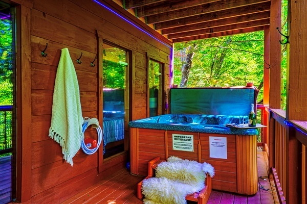 Hot tub outside game room, downstairs patio