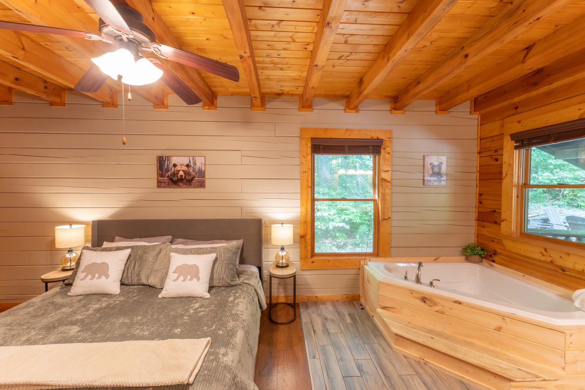 Our main floor master bedroom also has a comfy king bed and relaxing jacuzzi tub.