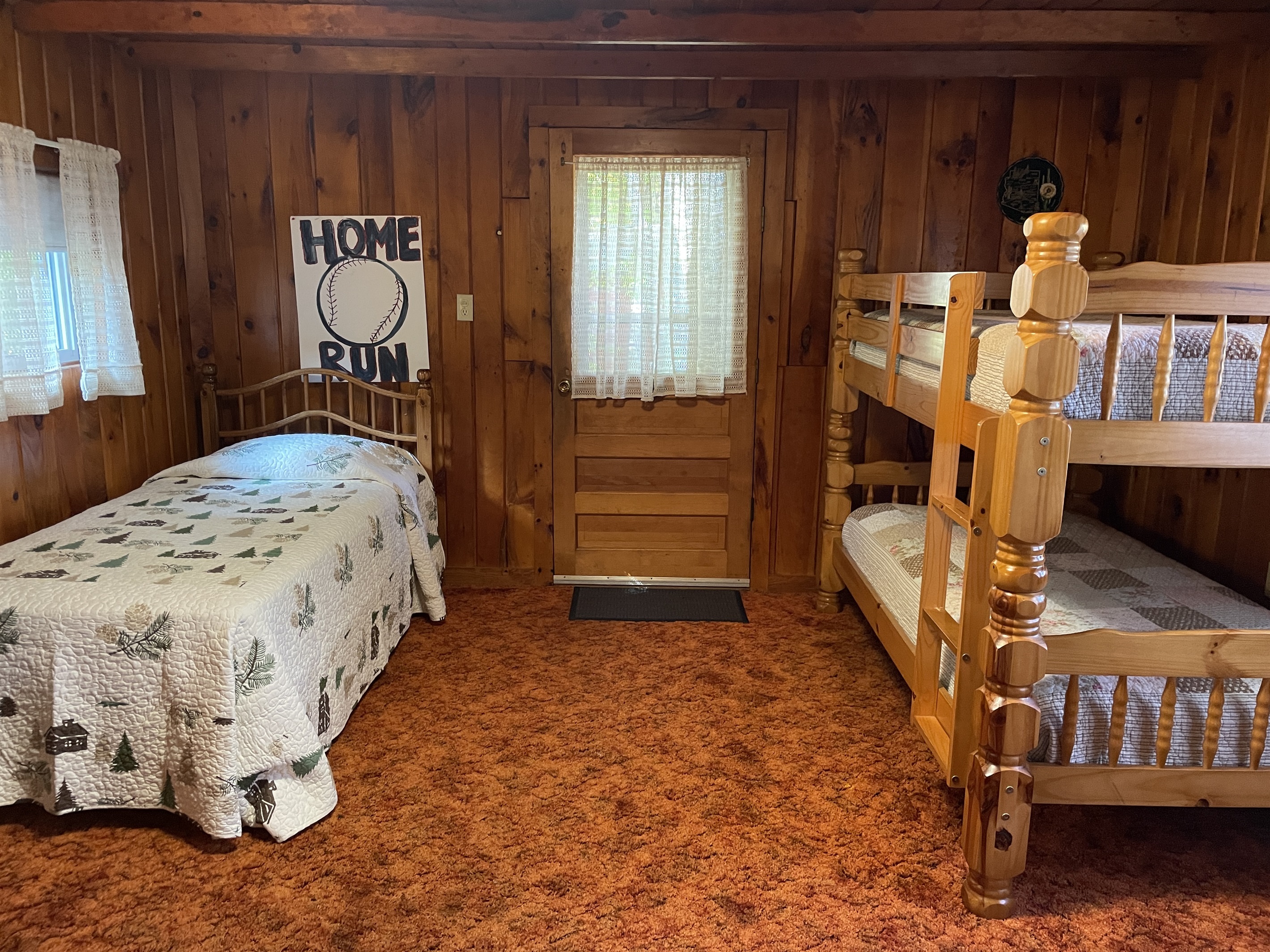 Bunk room with twin and bunkbeds