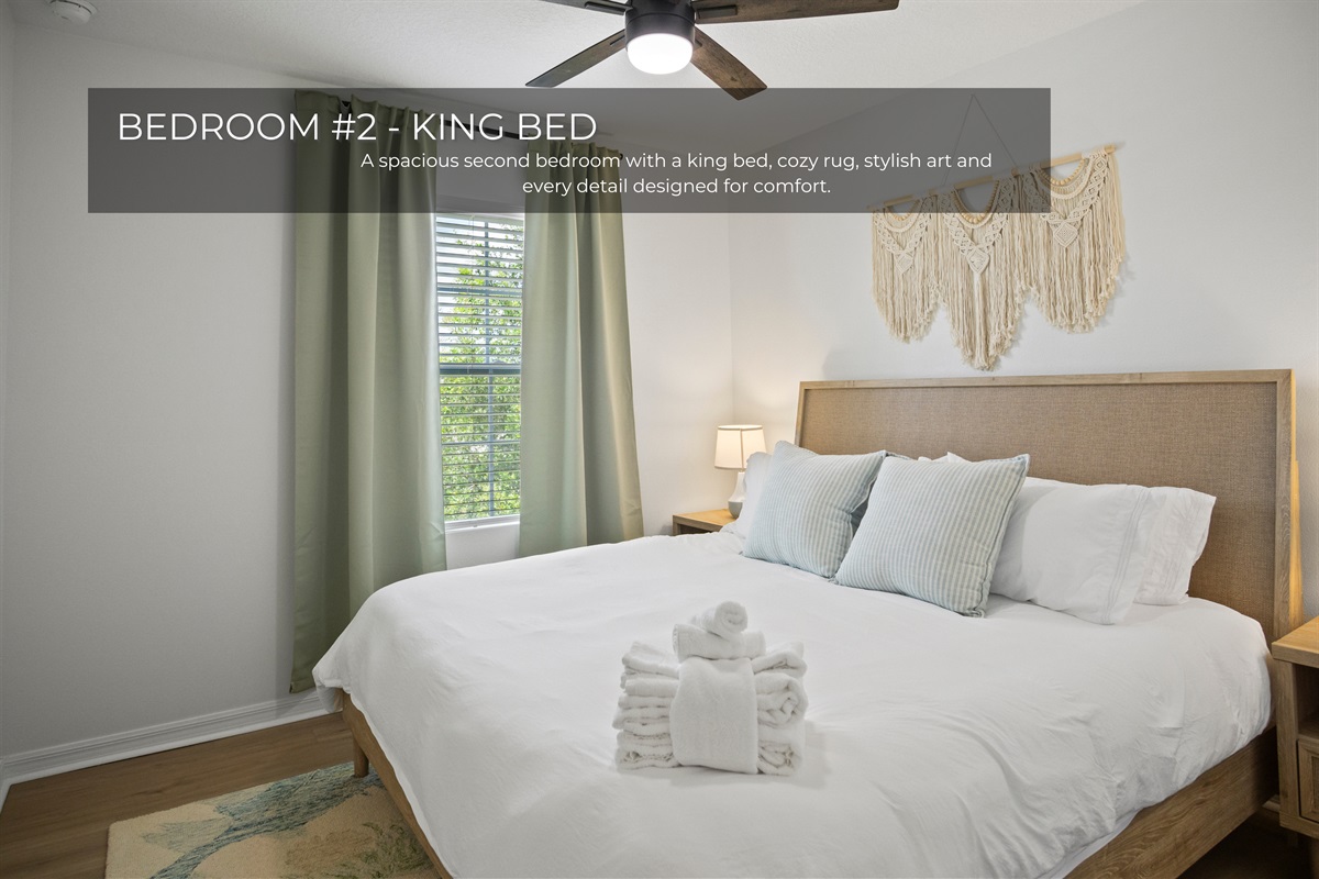 Spacious bedroom with a comfy king bed.