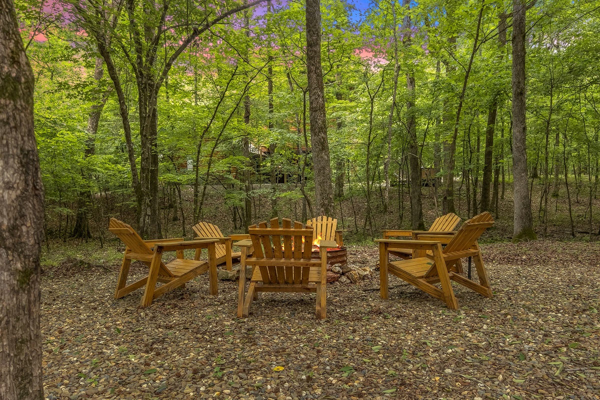 In the summer the wooded trees make you feel tucked into the forest.  A seasonal creek runs behind the property.