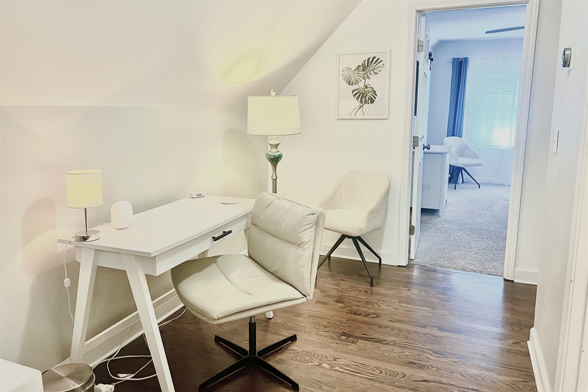 Perfect for remote work or creative projects. Located in a cozy area of the home with easy access to outlets and a relaxing atmosphere.