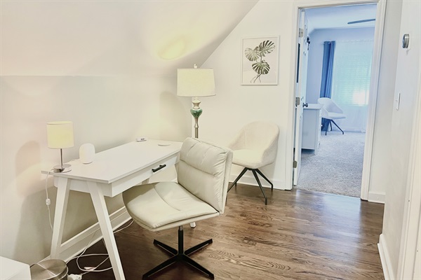 Perfect for remote work or creative projects. Located in a cozy area of the home with easy access to outlets and a relaxing atmosphere.