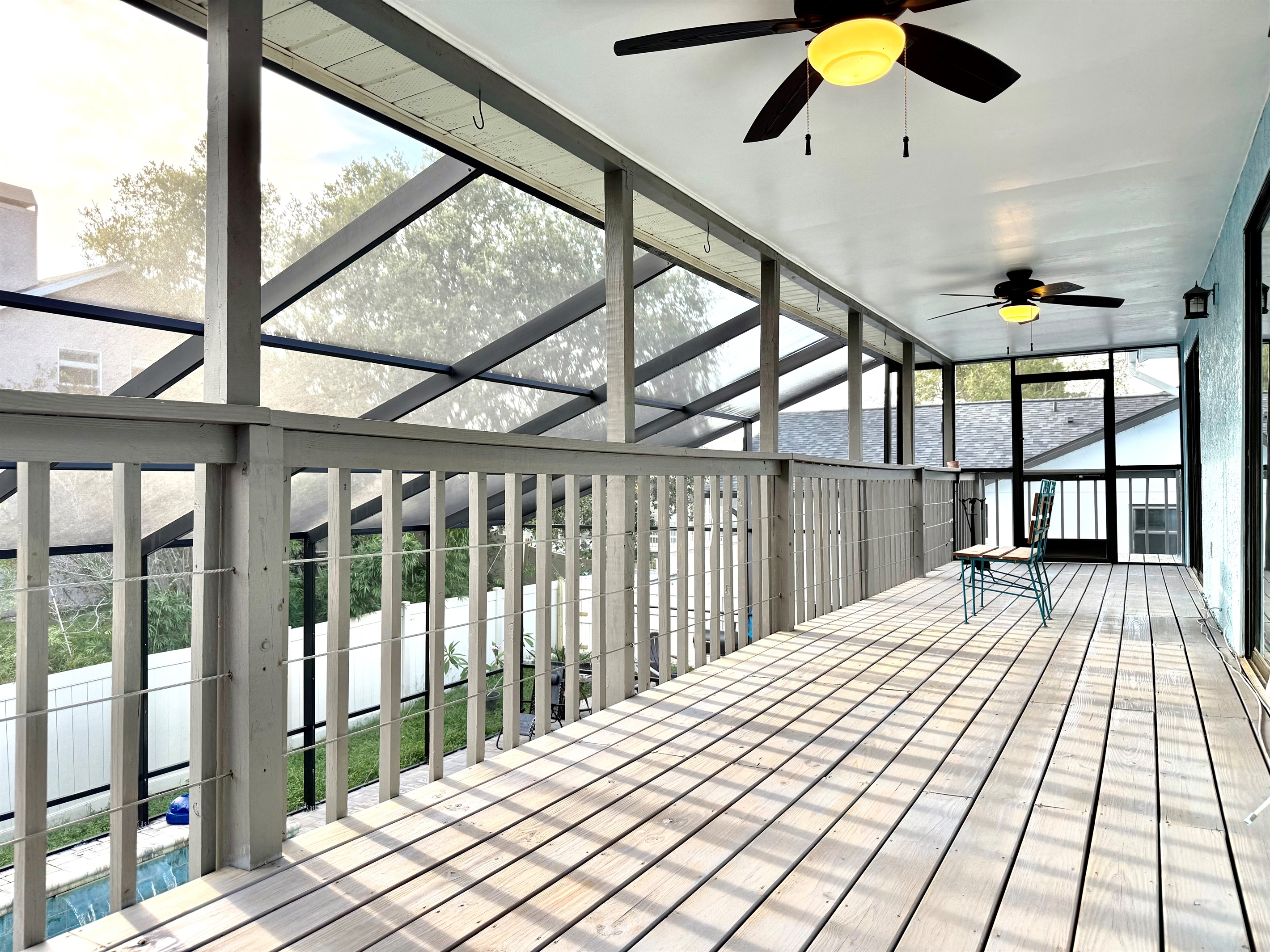 The perfect spot to sip your morning coffee, unwind with a book, or enjoy evening cocktails while taking in the view of the pool below.