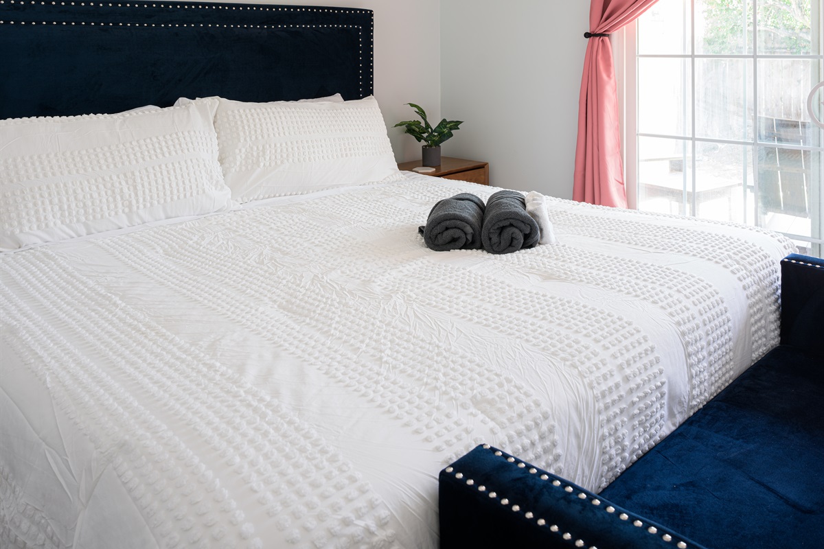 King bedroom has access to back patio