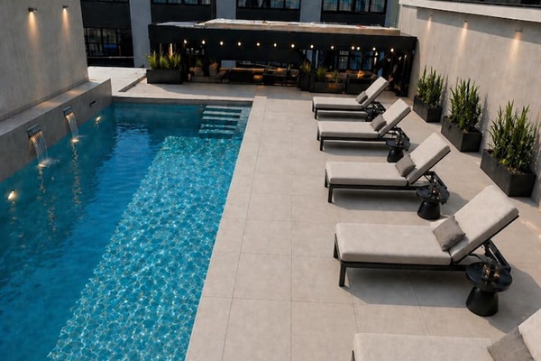 Access to the shared Rooftop pool at our nearby property (5 minutes walking distance) available starting June 15, 2026