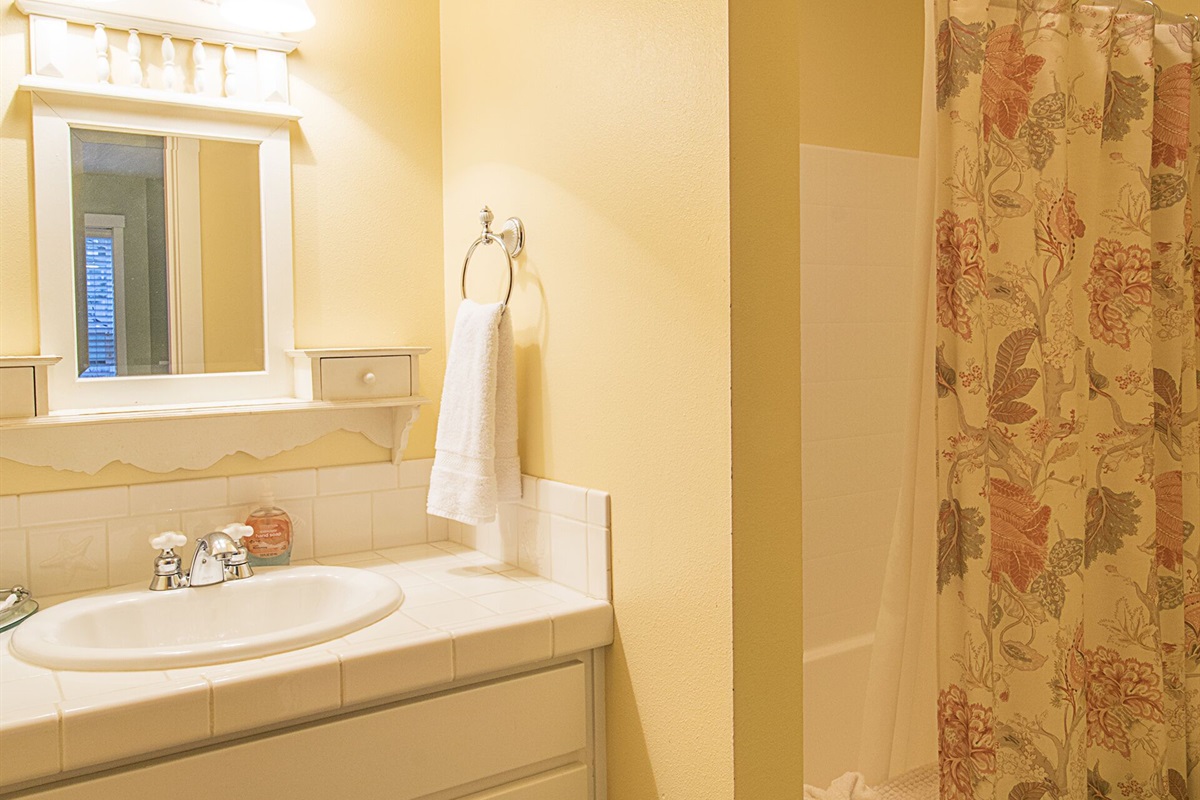 Your own private full bath, the perfect place to rinse off the sand and salt.