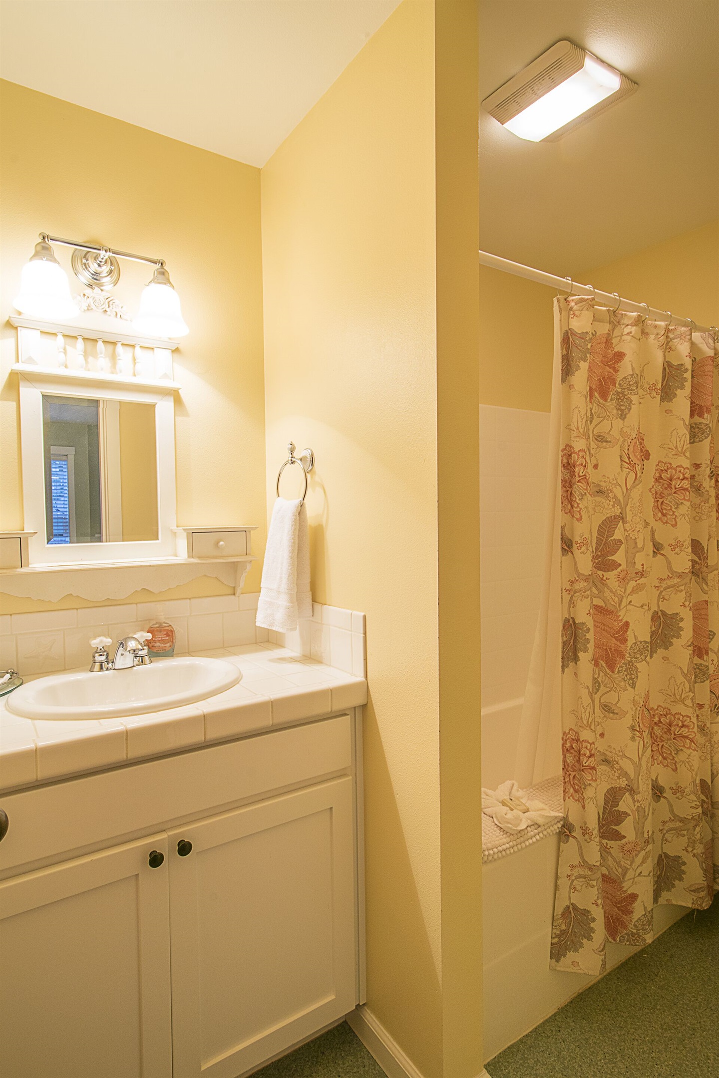 Your own private full bath, the perfect place to rinse off the sand and salt.