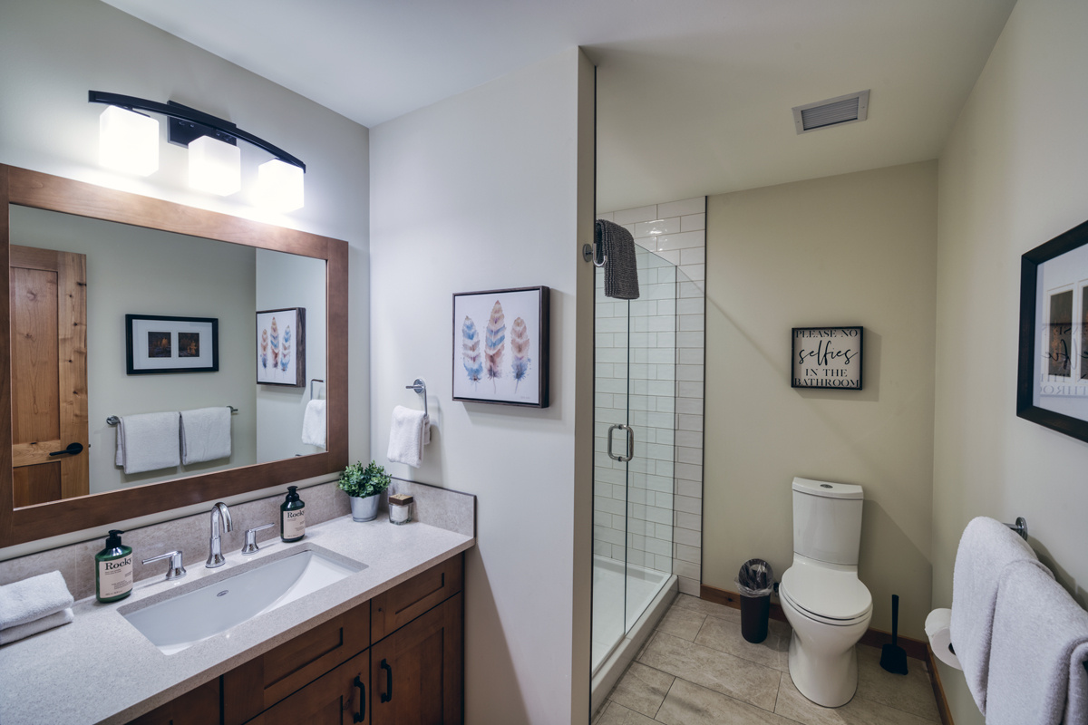 Second bathroom located in the hallway between the second and third bedrooms