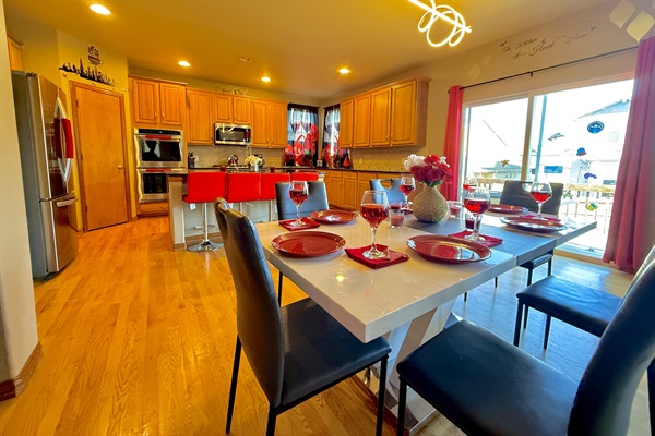 Elegant dining area with a seamless view of the expansive outdoor patio.